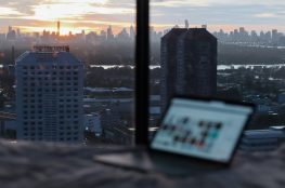 Laptop with skyscrapers in the background